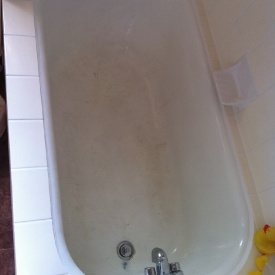 The tub looks pretty nasty here. I had to refinish it.